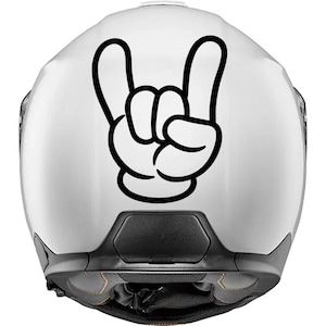 Peut inclure: Un casque de moto blanc arborant un grand graphisme noir et audacieux représentant une main de dessin animé faisant le signe du rock and roll. La main est centrée à l'arrière du casque, qui présente une finition lisse et brillante.