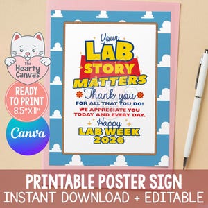 May include: A printable poster sign with a pink border and a blue and white cloud design. The poster reads "Your Lab Story Matters" with a thank you message and "Happy Lab Week 2026". A white pen rests on the right.