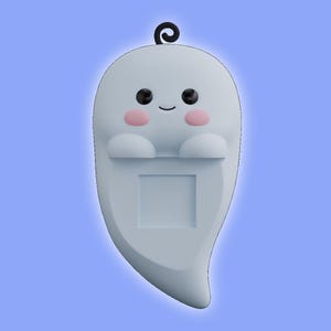 May include: A white ghost-shaped phone stand featuring a smooth surface, two black circular eyes, a small curved mouth, and two pink circular cheeks. A small black swirl sits on top of the head, and a square cutout is centered on the body.