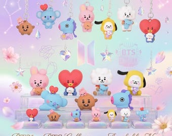 May include: A collection of BT21 character figurines and keychains featuring Tata, Mang, Chimmy, RJ, Cooky, Shooky, and Koya. The display includes various poses of these colorful cartoon figures on tiered stands with the text BT21 x BTS Collection.