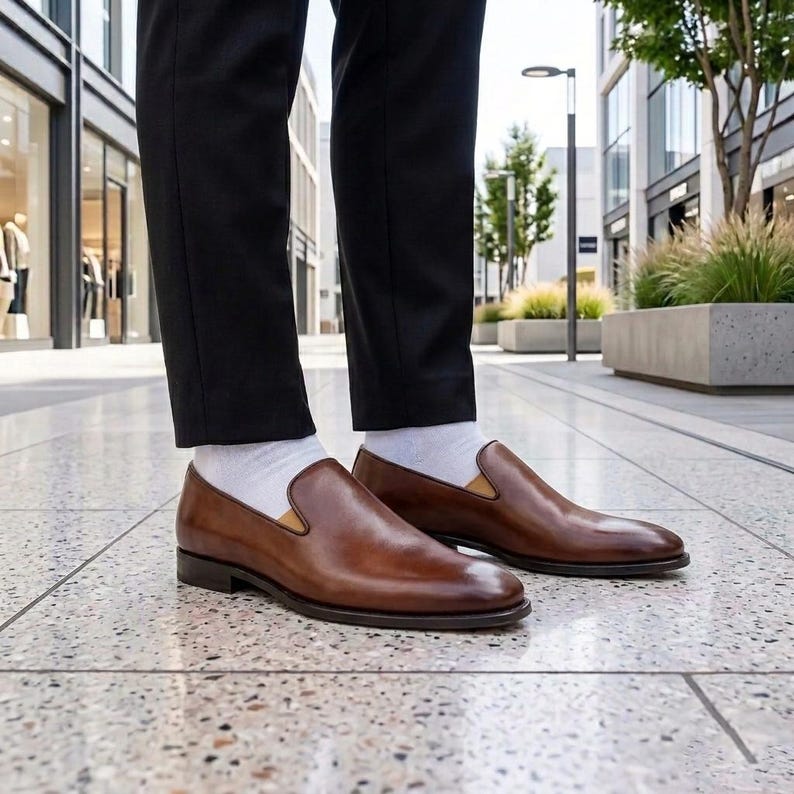 Brown leather loafers ready for a formal wedding outfit