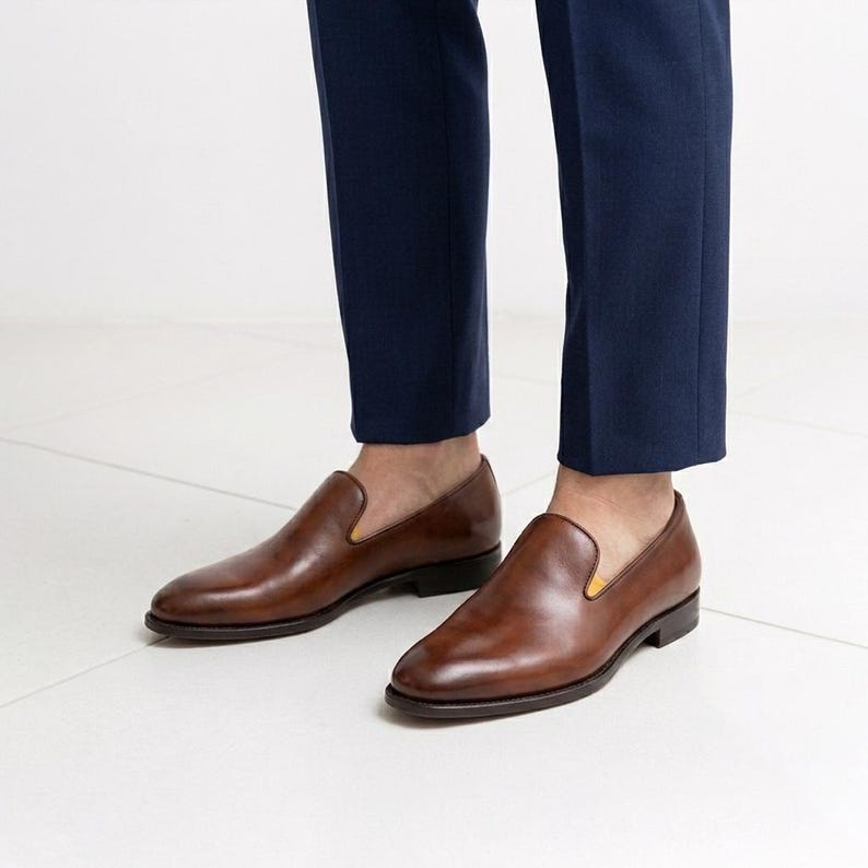Close up detail of stitched sole on mens dress loafers