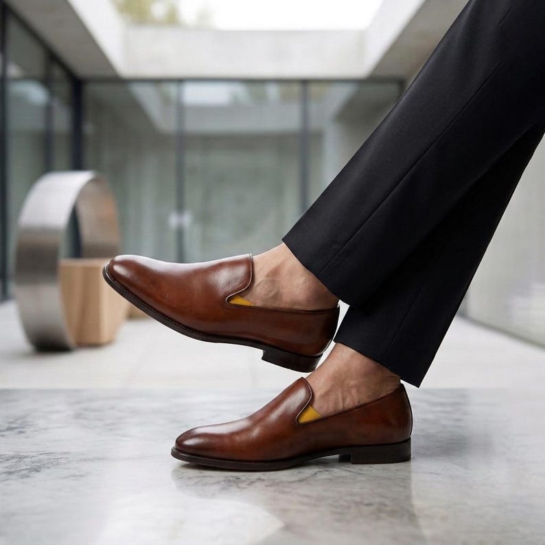 Slip on shoes paired with a tailored business casual look