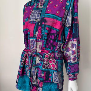 Vintage jaren 90 blouse met abstracte print kleurrijk boho-shirt oversized retro button-up top geometrisch lange mouw medium EU38
