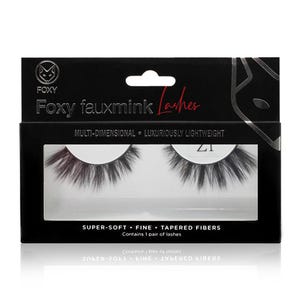May include: Black box of Foxy fauxmink Lashes. The box has the brand name and product description. The box contains a pair of black, tapered false eyelashes. The text on the box reads: SUPER-SOFT • FINE • TAPERED FIBERS.