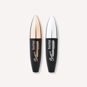 May include: Two black mascara tubes with metallic gold and silver caps. The tubes have the words "Romantic Beauty" and "Super Mascara" printed on them. The mascara is designed for professional make-up.