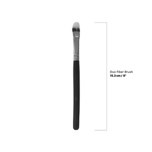 May include: A black-handled Duo Fiber Brush, 6 inches long, with a silver ferrule and a white and black brush head. The brush is designed for applying makeup.