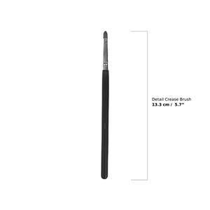 May include: A detail crease brush with a black handle and a silver ferrule. The brush head is a rounded, dark color. The brush is 5.7 inches long.