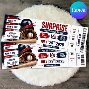 May include: Two rectangular baseball-themed event tickets featuring a black helmet, brown glove, white baseball, and wooden bat. Text includes SURPRISE, YOU'RE GOING TO SEE, RED TEAM VS BLUE TEAM, JULY 29TH 2025, FREEDOM FIELD, SEAT 22, ROW 06, SECTION 11, ADMIT ONE.
