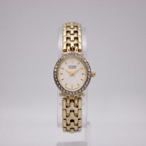 Citizen 5920-S023871 vintage ladies gold-tone quartz watch with sparkling stone bezel