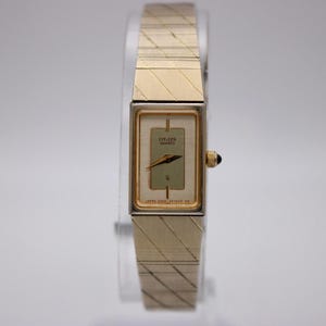 Citizen 2200-224167 k gold tone quartz ladies watch, vintage rectangular champagne dial