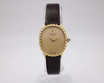 Raymond Weil 1620 vintage gold tone oval ladies watch, champagne dial, manual wind movement