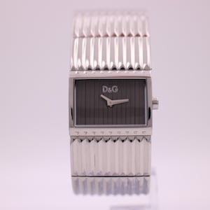 D&G women's rectangular quartz watch, grey striped dial, integrated stainless steel bracelet, 2000s fashion