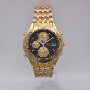 Seiko 5T52-7A2A world timer quartz watch, vintage gold tone traveller's timepiece