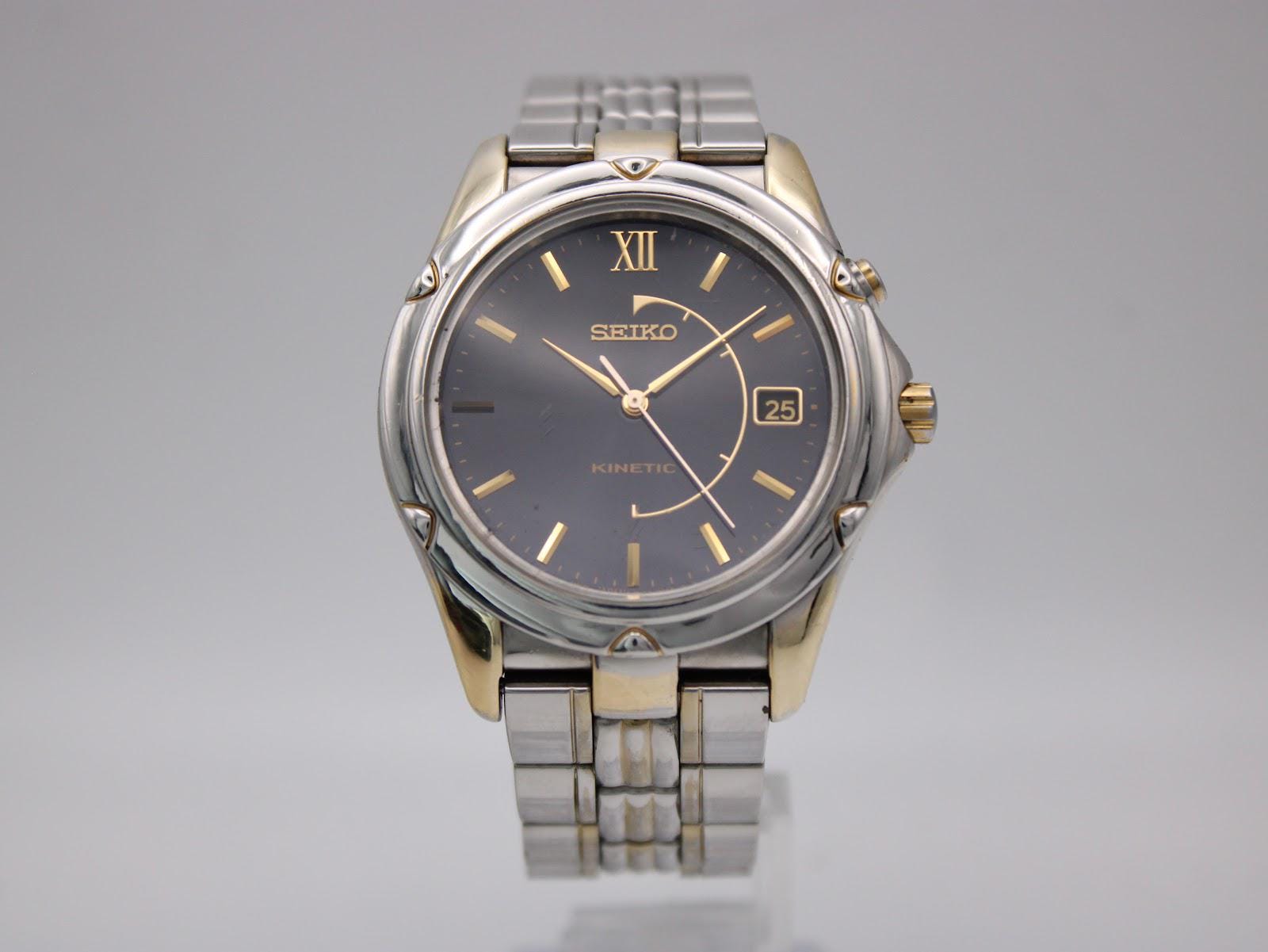 Seiko Kinetic Mens Watch 37mm Black Dial Two Tone Stainless 5M62-0C70 Date 7\