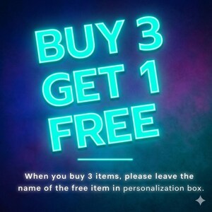 May include: A promotional graphic with the text "BUY 3 GET 1 FREE" in bright teal against a dark blue and purple gradient background. Below, smaller white text explains the offer's terms, instructing customers to specify their free item.