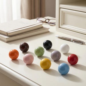 Pomelli rotondi in ceramica per mobili, maniglie colorate per cassetti, maniglie lucide per comò, pomelli per armadietti per camerette, accessori moderni per mobili.