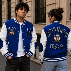 Couple wearing matching blue varsity jackets showing front and back streetwear fashion styling”