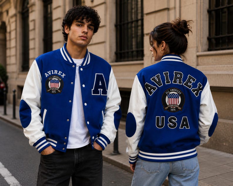 Couple wearing matching blue varsity jackets showing front and back streetwear fashion styling”