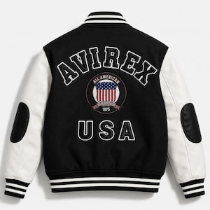 Black and white AVIREX varsity jacket back view with oversized embroidered USA logo and premium leather sleeves