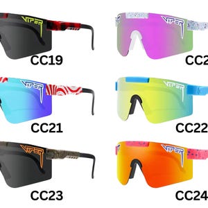 May include: Collection of six sunglasses with a wraparound design. The sunglasses feature various frame and lens colors, including black, blue, pink, and yellow. Each pair has the brand name "Viper" printed on the lens.