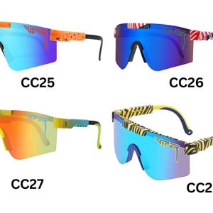 May include: Four pairs of Viper sunglasses with mirrored lenses. Styles include blue, orange, and yellow frames with various patterns, including an American flag design and a zebra print. Each pair is labeled with a "CC" code.