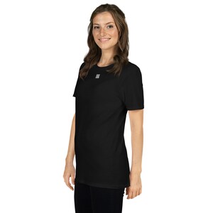 Casta Gansa QR · ¿Quedamos? · Camiseta unisex negra.