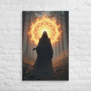 May include: A canvas print featuring a robed figure standing in a forest, with a glowing orb of light behind them. The figure is dark, and the orb is a bright orange and yellow. The artwork has a fantasy theme.