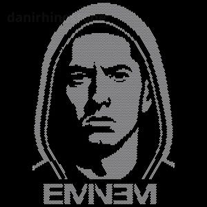 May include: A black graphic design featuring a white rhinestone portrait of a person wearing a hooded sweatshirt. The image is composed of small circular dots creating a high-contrast face. Below the portrait, the text EMN3M is spelled out in white.
