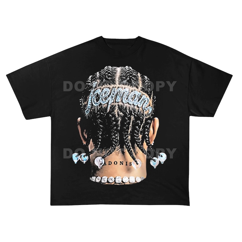 May include: A black t-shirt featuring a graphic print of the back of a head with braided hair. The word "iceman" is written in a light blue, crystalline font across the braids. Clear, spherical beads adorn the ends of the braids.