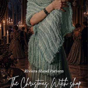 May include: A light green, fringed shawl is worn over the shoulders. The shawl is part of the "Riviera Shawl Pattern" from "The Christmas Witch Shop." The image has a dark, elegant background with text that reads "Crochet Patterns & Spooky Vibes."