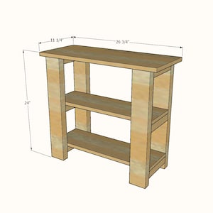 Peut inclure: Une console en bois clair avec deux &eacute;tag&egrave;res et quatre montants verticaux. La structure est annot&eacute;e avec des dimensions de 67,95 cm de largeur, 28,58 cm de profondeur et 60,96 cm de hauteur, pr&eacute;sent&eacute;es dans un sch&eacute;ma technique.