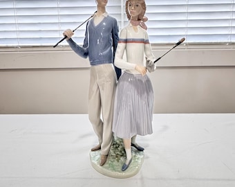 Lladro golfing couple porcelain figure # 1453