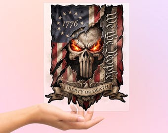 May include: A DTF transfer featuring a skull with glowing orange eyes, superimposed on a distressed American flag design. The design includes the text "1776", "We the People", and "Liberty or Death". The words "FAST DTF TRANSFER" and "READY TO PRESS" are also visible.