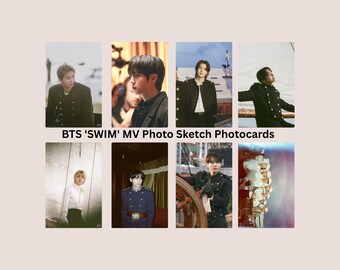 May include: A collection of eight rectangular BTS 'SWIM' MV Photo Sketch photocards featuring individual portraits and group shots of the members in nautical-themed attire, including dark button-up jackets and white shirts, arranged in two rows of four.