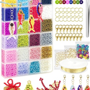 May include: A clear plastic organizer filled with colorful beads, fish-shaped keychains, and jewelry-making supplies. Includes gold clasps, jump rings, and a spool of gold wire. Additional beaded gift box, Christmas tree, and dragon.