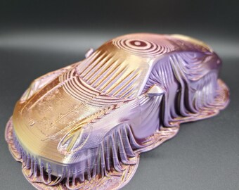 Escultura de coche deportivo impresa en 3D: diseño futurista en capas, decoración de escritorio de filamento de seda bicolor.