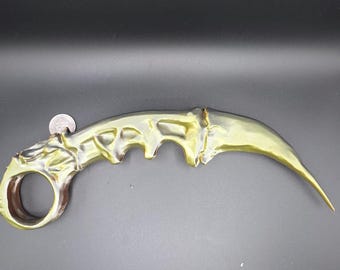 Réplica épica de karambit metálico: hoja de fantasía hecha a mano en oro/cobre.