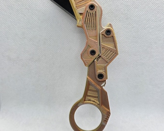 Navaja multiusos plegable futurista con mango anular estilo cyberpunk (impresa en 3D)