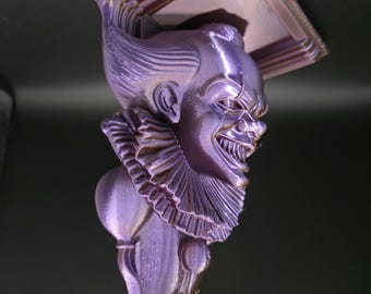 Escultura de terror mítico impresa en 3D: busto de demonio púrpura dorado que cambia de color.