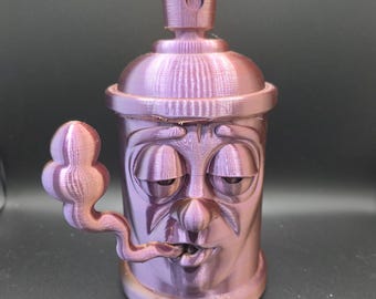 Escultura de lata de pintura en aerosol de dibujos animados morados iridiscentes – Arte en pipa con cara de gruñón impreso en 3D – Decoración de escritorio única