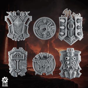 May include: A collection of six grey miniature shields featuring varied designs including a dragon head, a hammer emblem, spiked armor plating, and textured stone or wood patterns. Each shield is rendered in a detailed, unpainted resin style.