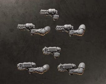 May include: A set of five unpainted grey resin miniature weapon components, including three plasma-style guns and two bolt-style guns, some featuring integrated shoulder pads and skull detailing, arranged on a dark background with the text GUNS.