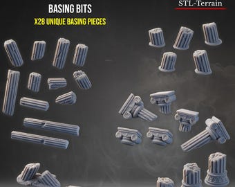 May include: A collection of 28 grey resin miniature basing bits featuring Gothic Roman columns. The set includes various column segments, broken pillars, and ornate capitals with detailed fluting and architectural textures for tabletop gaming.