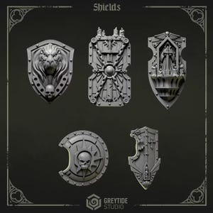 May include: A set of five grey miniature shields featuring intricate designs including a lion head with a skull, a rectangular shield with chains and candles, a shield with a central figure, a circular shield with a skull, and a pointed shield.