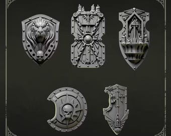 May include: A set of five grey miniature shields featuring intricate designs including a lion head with a skull, a rectangular shield with chains and candles, a shield with a central figure, a circular shield with a skull, and a pointed shield.