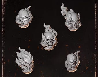 May include: Five grey miniature heads labeled HEADS 1 by Greytide Studio. Each head features a unique design with flame-like protrusions, skull-like facial structures, and mechanical elements, presented against a dark background with embers.
