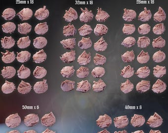 May include: A collection of pink resin miniature bases labeled Gothic Sector City Ruins, featuring various architectural debris and textures. The set includes 18 bases at 25mm, 18 at 32mm, 18 at 28mm, 8 at 40mm, and 6 at 50mm, all displaying detailed rubble.