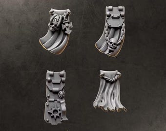 May include: Four grey miniature loincloths for tabletop gaming figures. The pieces feature sculpted details including skulls, chains, rope textures, and a star emblem. The text LOINCLOTHS and GREYTIDE STUDIO is visible at the top and bottom of the image.