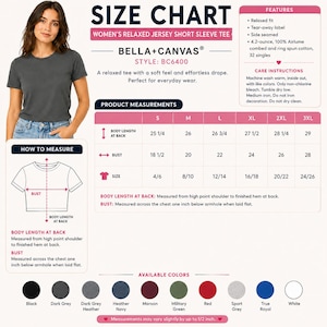 May include: A woman wearing a dark grey short sleeve tee shirt. The image includes a size chart for women's relaxed jersey short sleeve tees, with measurements in inches, and available colors including black, red, and white.